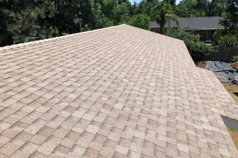 Tan composition shingle re-roof