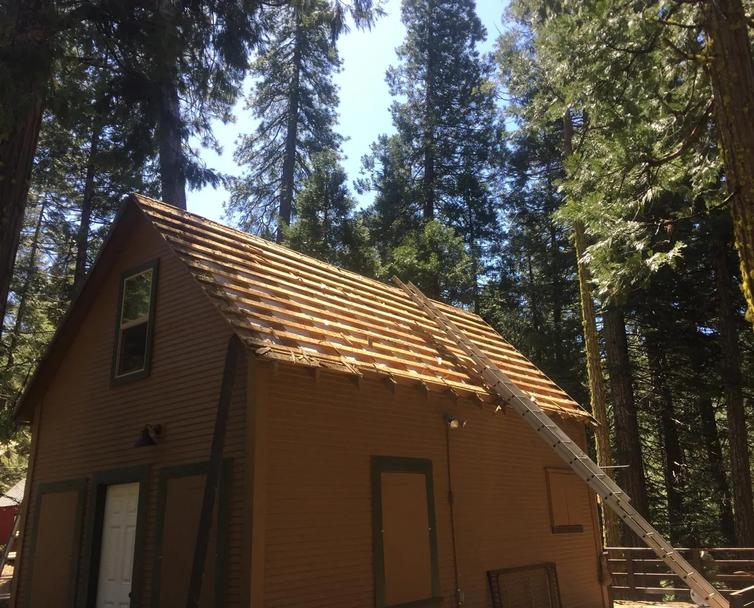 Before: Mountain cabin re-roof in standing seam metal