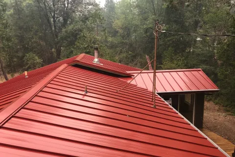 Red standing seam metal roof