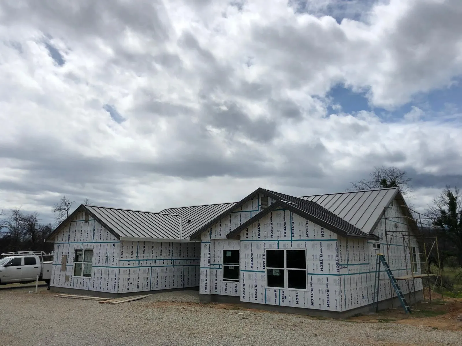 After: New home with a standing seam metal roof