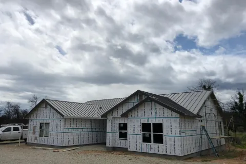 New home with a standing seam metal roof