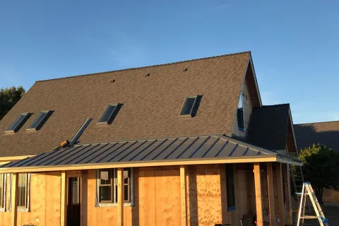 Metal porch roof with skylights