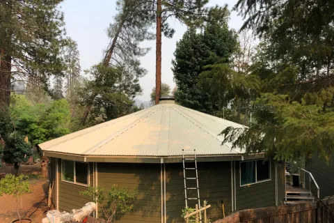 Metal roof on a round building