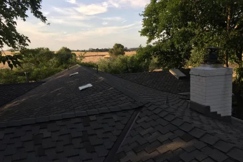 Hillside home: tear-off to new composition shingles