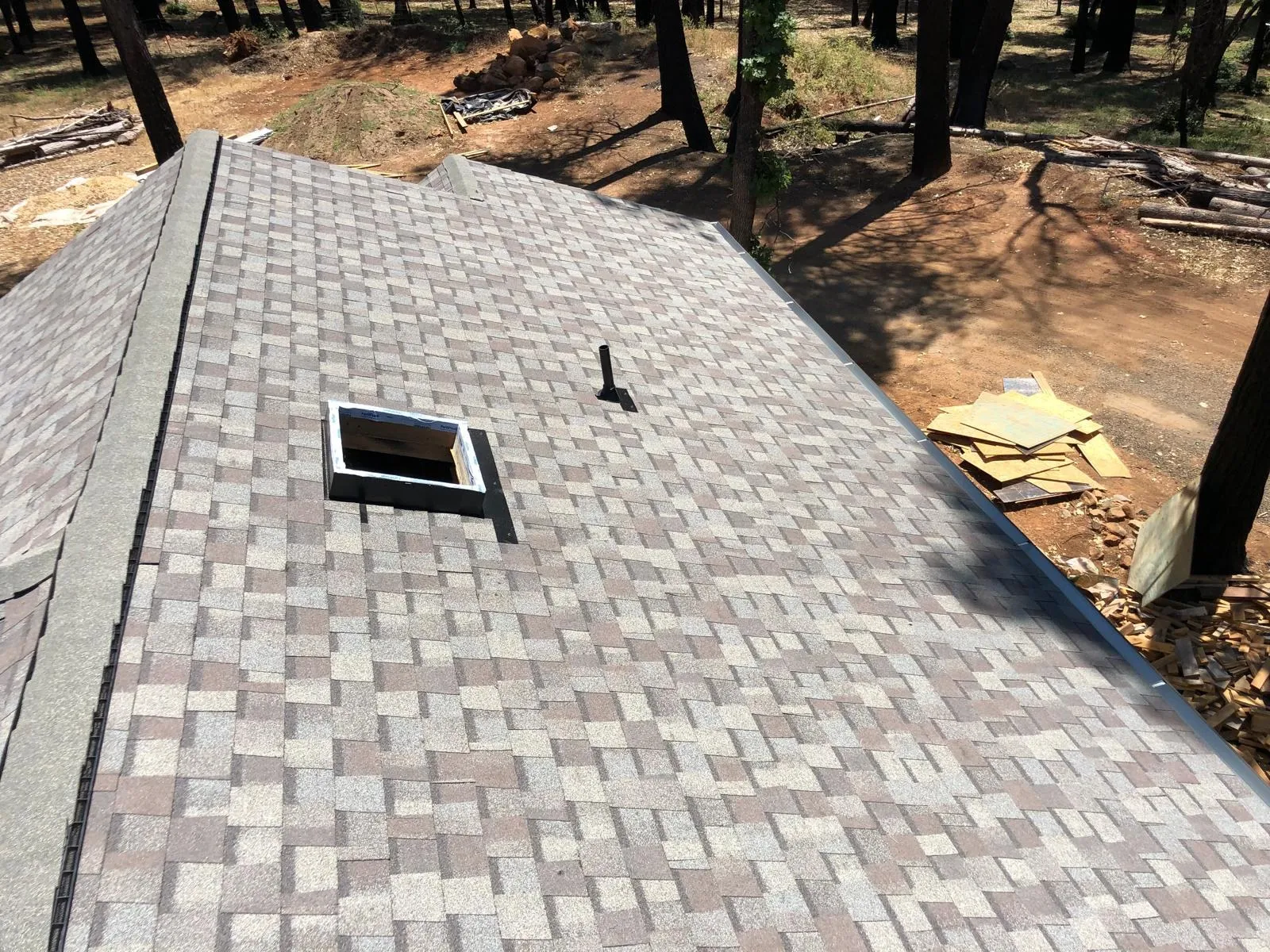 After: Shingle roof with a skylight